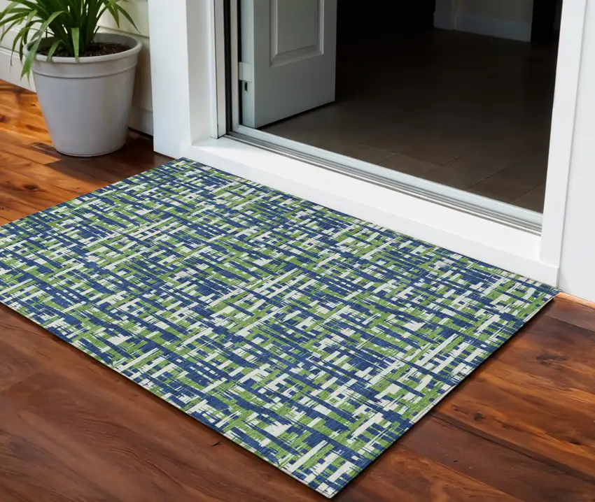 Navy Blue Green And Ivory Abstract Washable Indoor Outdoor Area Rug Photo 1