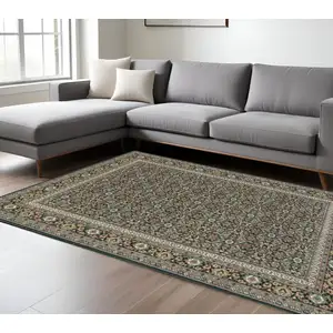 Photo of Navy Blue Green Red Ivory And Yellow Oriental Power Loom Stain Resistant Area Rug