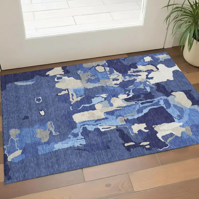 Navy Blue Ivory And Beige Abstract Washable Area Rug With UV Protection Photo 1