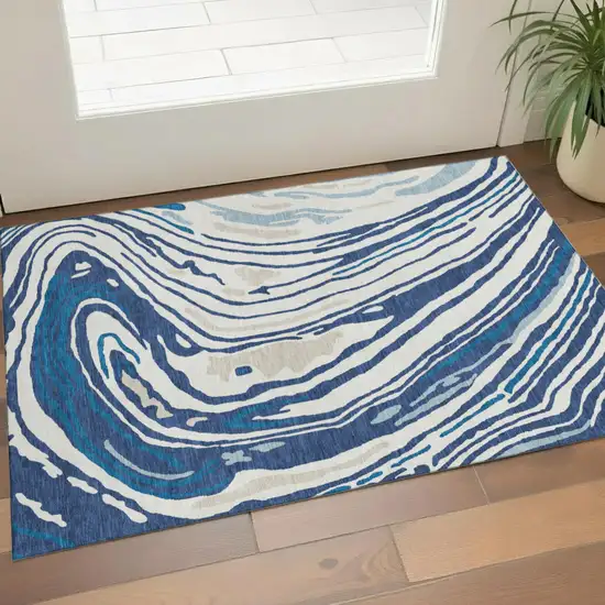 Navy Blue Ivory And Beige Abstract Washable Area Rug With UV Protection Photo 1