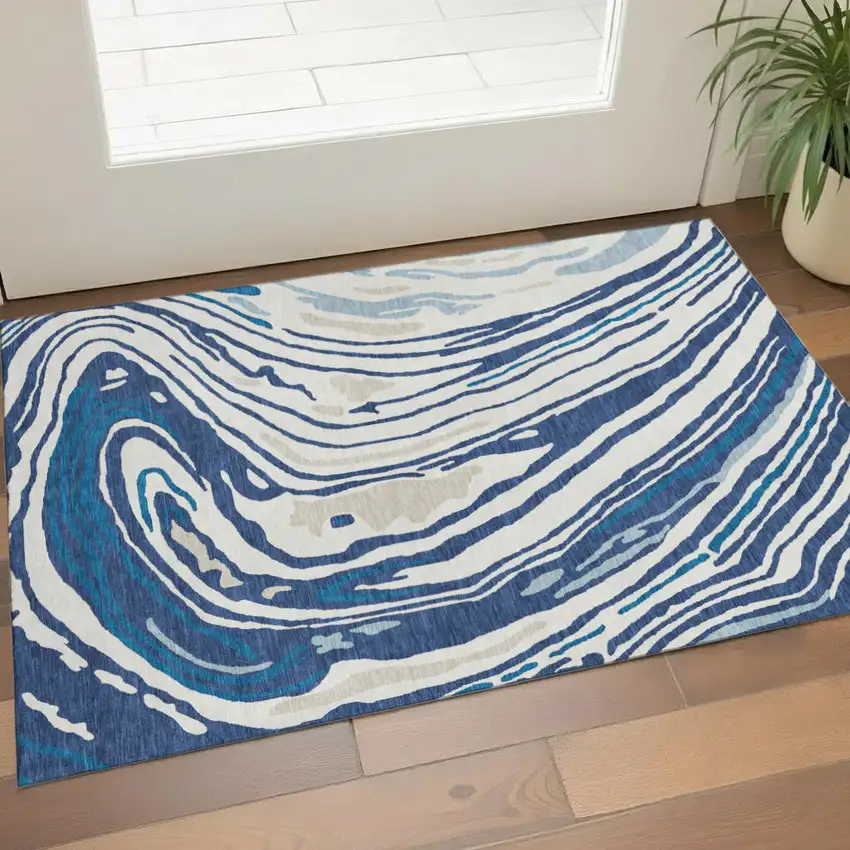 Navy Blue Ivory And Beige Abstract Washable Area Rug With UV Protection Photo 1