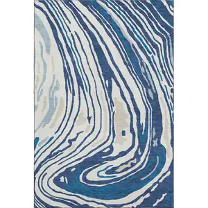 Photo of Navy Blue Ivory And Beige Abstract Washable Area Rug With UV Protection