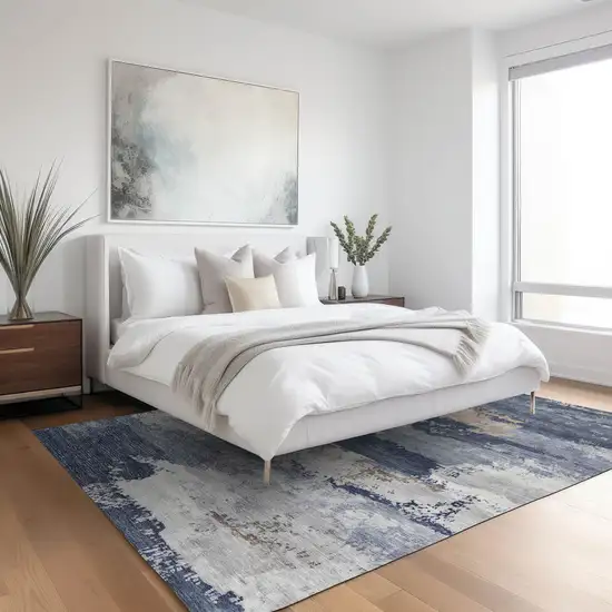 Navy Blue Ivory And Beige Abstract Washable Indoor Outdoor Area Rug Photo 5