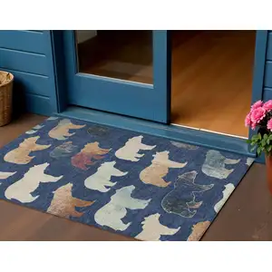 Photo of Navy Blue Ivory And Beige Animal Print Washable Indoor Outdoor Area Rug