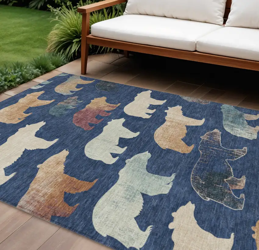 Navy Blue Ivory And Beige Animal Print Washable Indoor Outdoor Area Rug Photo 1