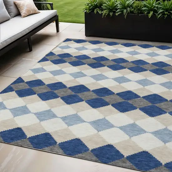 Navy Blue Ivory And Beige Geometric Washable Indoor Outdoor Area Rug Photo 1