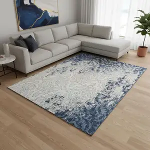 Photo of Navy Blue Ivory And Beige Medallion Washable Area Rug With UV Protection
