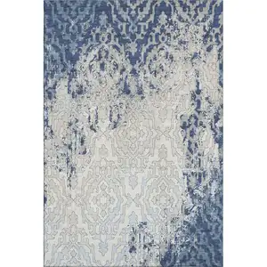 Photo of Navy Blue Ivory And Beige Medallion Washable Area Rug With UV Protection