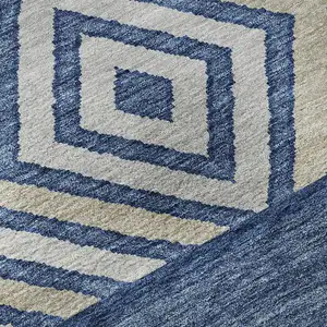 Photo of Navy Blue Ivory And Beige Southwestern Washable Area Rug With UV Protection