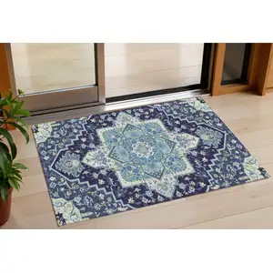 Photo of Navy Blue Ivory And Black Oriental Washable Indoor Outdoor Area Rug