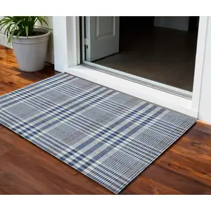 Photo of Navy Blue Ivory And Brown Plaid Washable Indoor Outdoor Area Rug