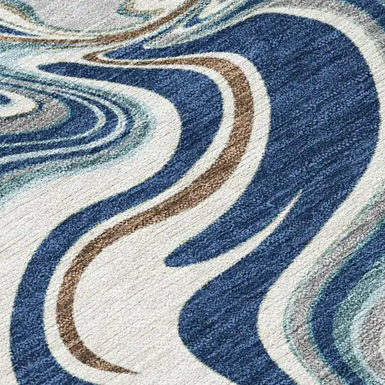 Navy Blue Ivory And Gold Abstract Washable Indoor Outdoor Area Rug Photo 3