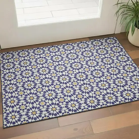 Navy Blue Ivory And Gold Geometric Washable Area Rug With UV Protection Photo 2