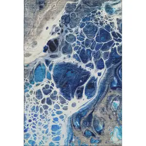 Photo of Navy Blue Ivory And Gray Abstract Washable Area Rug With UV Protection