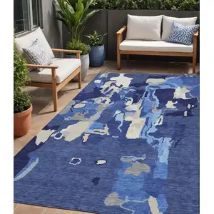 Photo of Navy Blue Ivory And Gray Abstract Washable Indoor Outdoor Area Rug