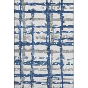 Photo of Navy Blue Ivory And Gray Striped Washable Area Rug With UV Protection