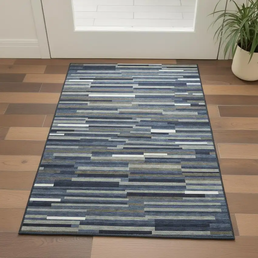 Navy Blue Ivory And Gray Striped Washable Area Rug With UV Protection Photo 2