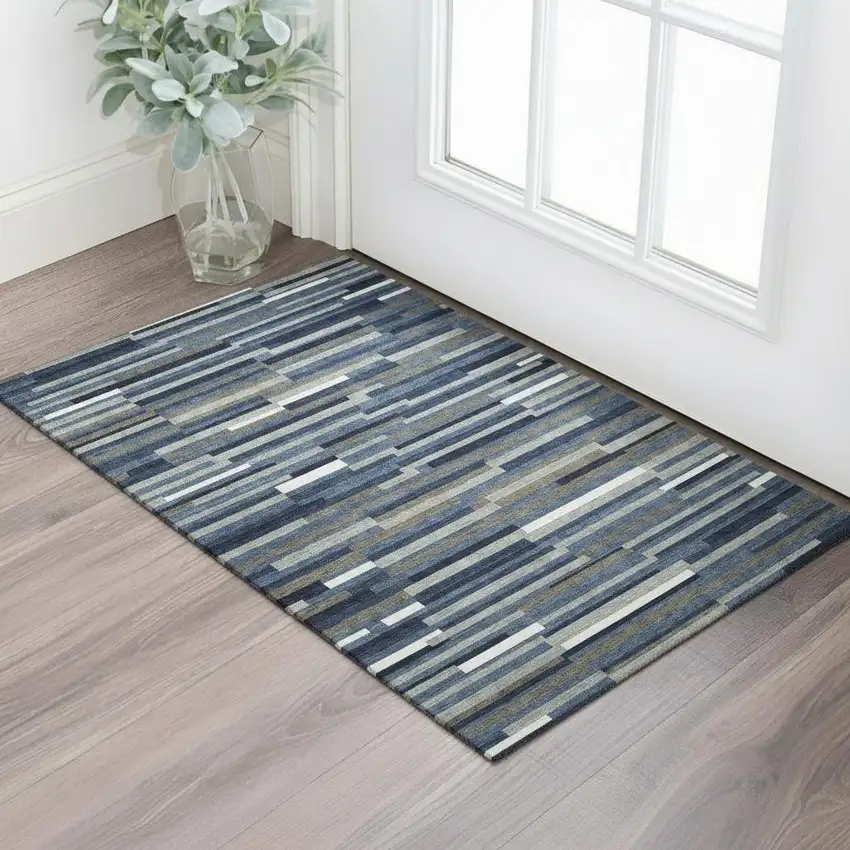 Navy Blue Ivory And Gray Striped Washable Area Rug With UV Protection Photo 1