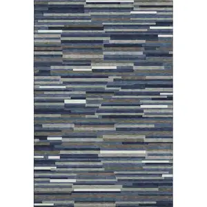 Photo of Navy Blue Ivory And Gray Striped Washable Area Rug With UV Protection