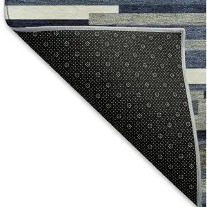 Photo of Navy Blue Ivory And Gray Striped Washable Area Rug With UV Protection