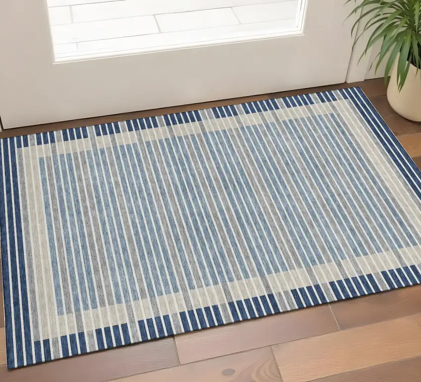 Navy Blue Ivory And Gray Striped Washable Area Rug With UV Protection Photo 1