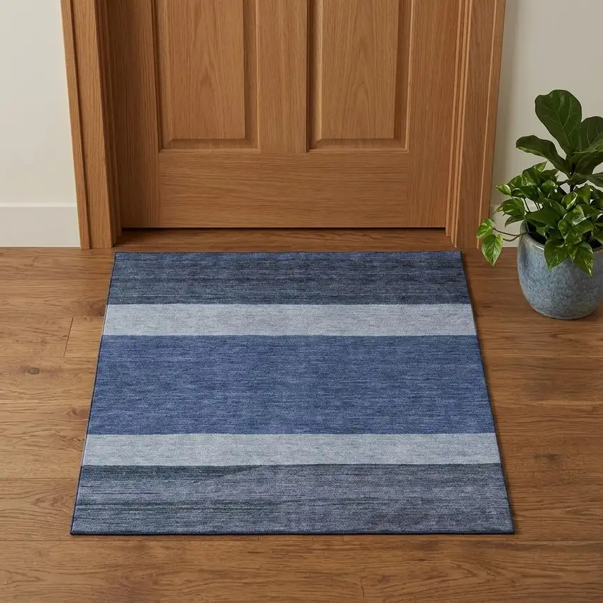 Navy Blue Ivory And Gray Striped Washable Area Rug With UV Protection Photo 1