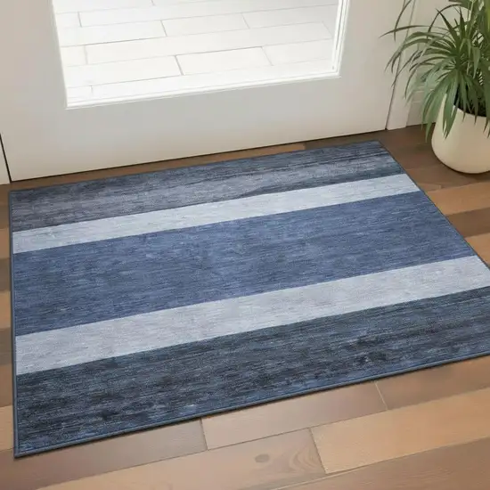 Navy Blue Ivory And Gray Striped Washable Area Rug With UV Protection Photo 2