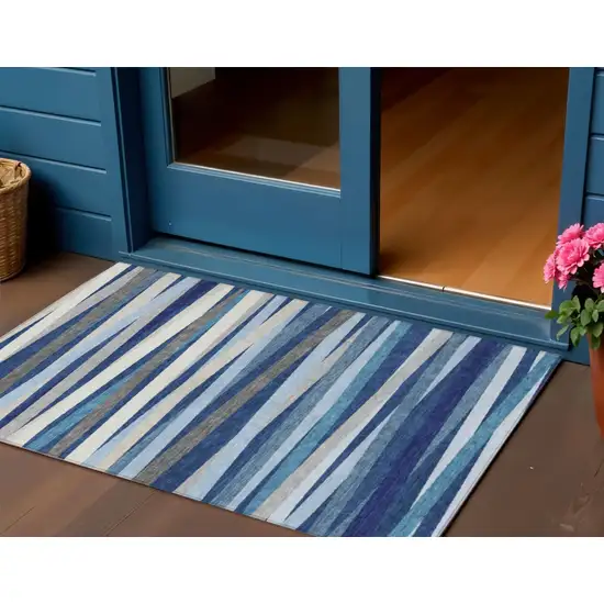 Navy Blue Ivory And Gray Striped Washable Indoor Outdoor Area Rug Photo 1