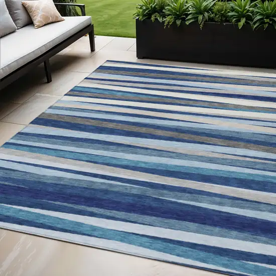 Navy Blue Ivory And Gray Striped Washable Indoor Outdoor Area Rug Photo 1