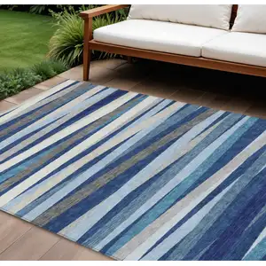 Photo of Navy Blue Ivory And Gray Striped Washable Indoor Outdoor Area Rug