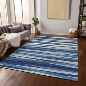 Photo of Navy Blue Ivory And Gray Striped Washable Indoor Outdoor Area Rug