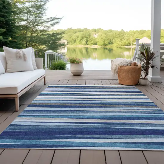 Navy Blue Ivory And Gray Striped Washable Indoor Outdoor Area Rug Photo 9
