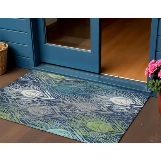 Navy Blue Ivory And Green Floral Washable Indoor Outdoor Area Rug Photo 1