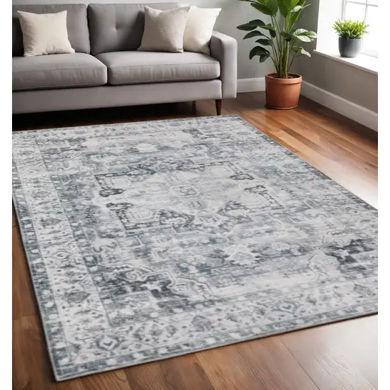 Navy Blue Ivory And Grey Oriental Printed Stain Resistant Non Skid Area Rug Photo 1
