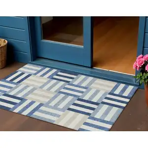 Photo of Navy Blue Ivory And Khaki Geometric Washable Indoor Outdoor Area Rug