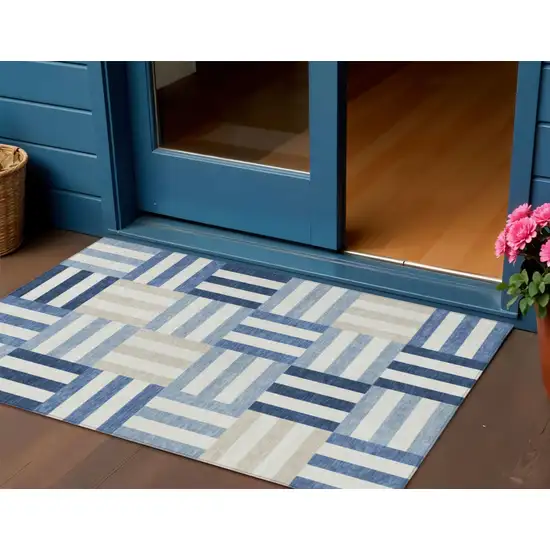 Navy Blue Ivory And Khaki Geometric Washable Indoor Outdoor Area Rug Photo 1