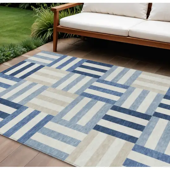 Navy Blue Ivory And Khaki Geometric Washable Indoor Outdoor Area Rug Photo 1