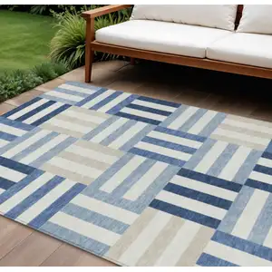 Photo of Navy Blue Ivory And Khaki Geometric Washable Indoor Outdoor Area Rug