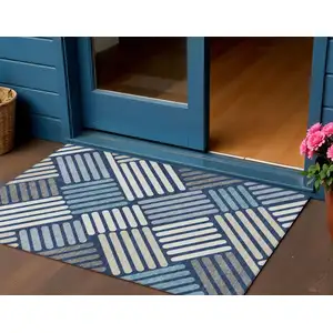 Photo of Navy Blue Ivory And Pewter Geometric Washable Indoor Outdoor Area Rug