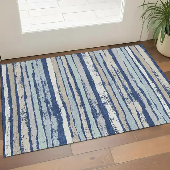 Navy Blue Ivory And Taupe Striped Washable Area Rug With UV Protection Photo 1