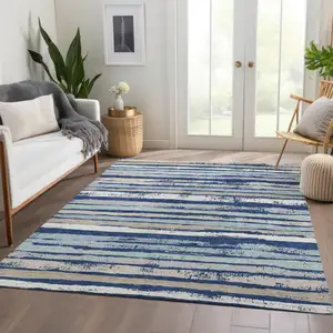 Photo of Navy Blue Ivory And Taupe Striped Washable Area Rug With UV Protection