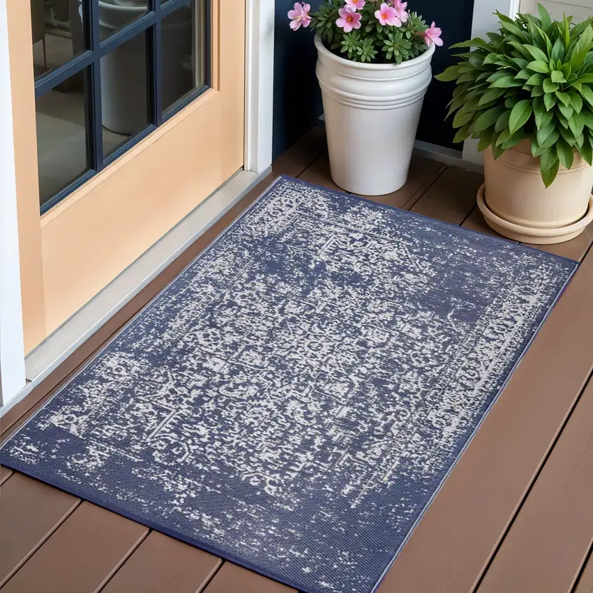 Navy Blue Machine Braided Distressed Area Rug With UV Protection Photo 1