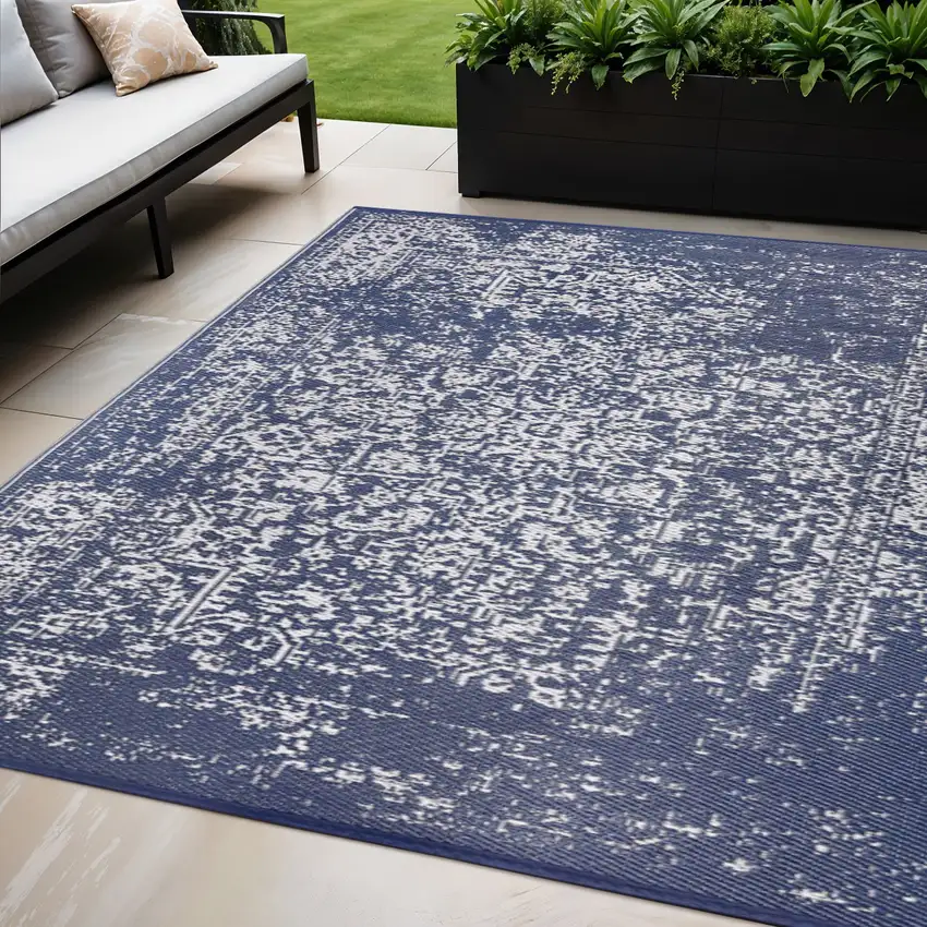 Navy Blue Machine Braided Distressed Area Rug With UV Protection Photo 1