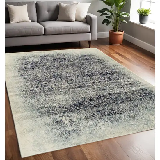 Navy Blue And Ivory Medallion Area Rug Photo 1