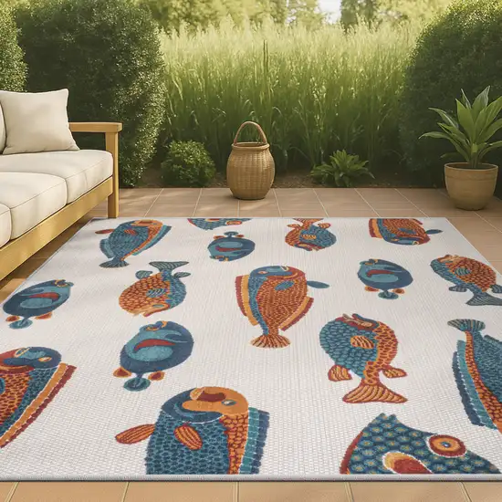 Navy Blue Orange And Cream Animal Print Indoor Outdoor Area Rug Photo 4