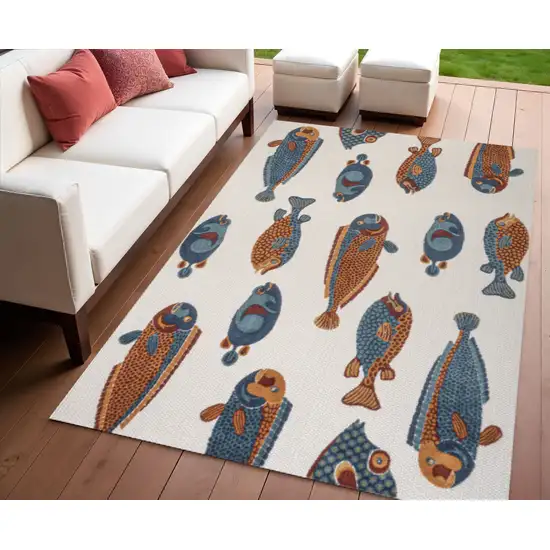 Navy Blue Orange And Cream Animal Print Indoor Outdoor Area Rug Photo 1
