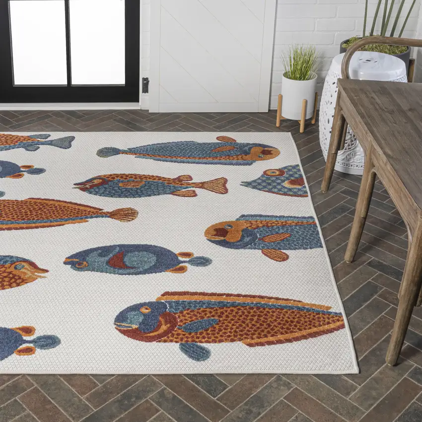 Navy Blue Orange And Cream Animal Print Indoor Outdoor Area Rug Photo 9