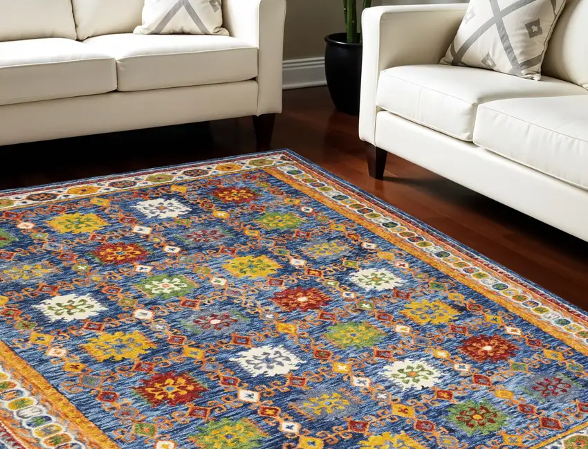 Navy Blue Orange And Green Wool Floral Hand Tufted Distressed Area Rug Photo 1