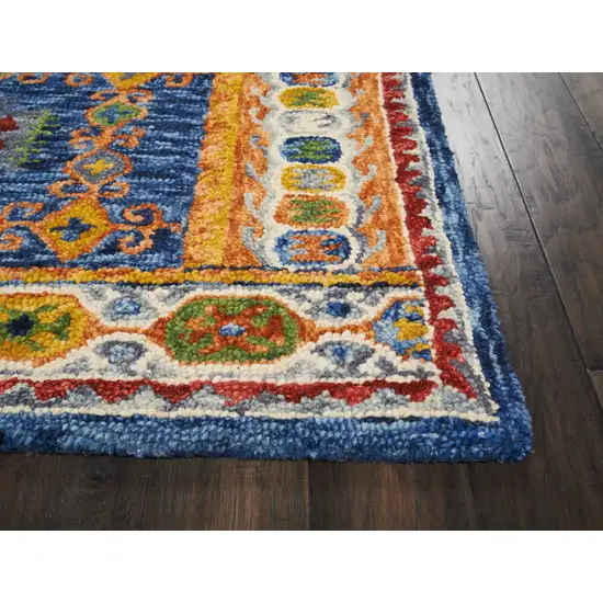 Navy Blue Orange And Green Wool Floral Hand Tufted Distressed Area Rug Photo 4