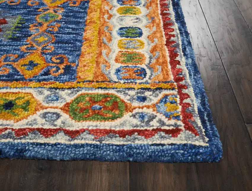 Navy Blue Orange And Green Wool Floral Hand Tufted Distressed Area Rug Photo 4